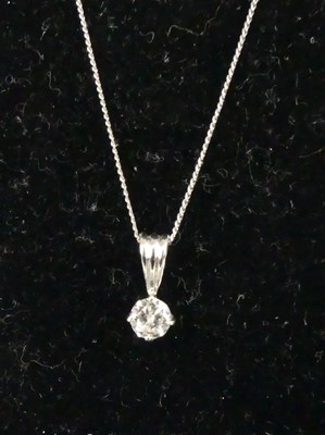 Lot 344 - An 18ct white gold diamond pendant, the claw...