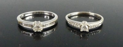 Lot 360 - A modern 9ct white gold diamond solitaire ring,...