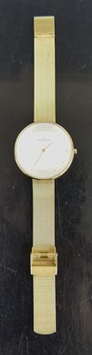 Lot 365 - A Skagen gilt metal quartz dress watch, in box,...