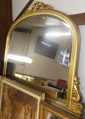 Lot 1013 - A reproduction gilt composition overmantel...