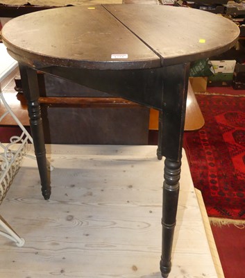 Lot 1246 - A 19th century provincial mahogany circular...