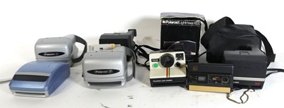 Lot 456 - A large collection of polaroid cameras to...
