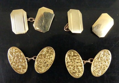 Lot 368 - A pair of 15ct gold and engraved oval...