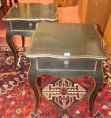 Lot 1307 - A pair of contemporary black painted shaped...