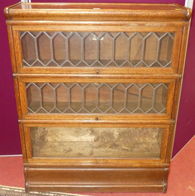 Lot 1315 - A 1930s Globe Wernicke Company oak three-tier...