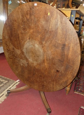 Lot 1316 - A 19th century mahogany circular tilt-top...