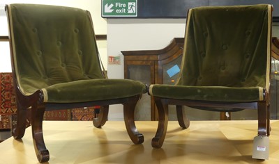 Lot 1317 - A pair of mahogany and velour green fabric...