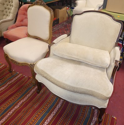 Lot 1324 - A French walnut framed and pale fabric...