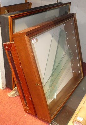 Lot 1077 - A Chinese hardwood wall mounted mirrorback...