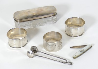 Lot 179 - A pair of silver napkin rings, together with a...