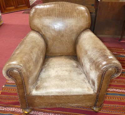 Lot 1328 - An early 20th century tan leather upholstered...
