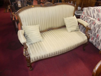 Lot 1336 - A mid-Victorian walnut two-seater salon sofa,...