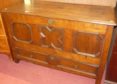 Lot 1348 - An 18th century joined oak three-panelled...
