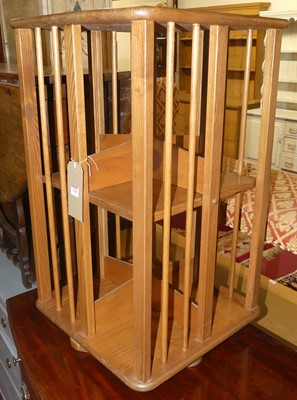 Lot 1350 - An elm 8-division revolving bookcase, width 45cm