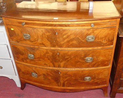 Lot 1351 - A Regency mahogany and flame mahogany bowfront...