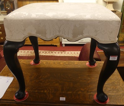 Lot 1356 - A 19th century mahogany dressing stool, raised...