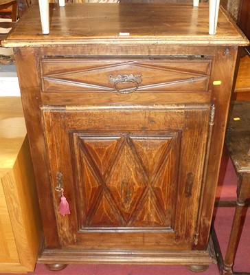 Lot 1369 - A provincial French walnut single door side...