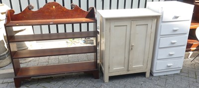 Lot 1389 - A stained pine and mahogany freestanding open...