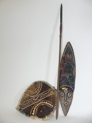 Lot 376 - An African tribal sword having a carved...