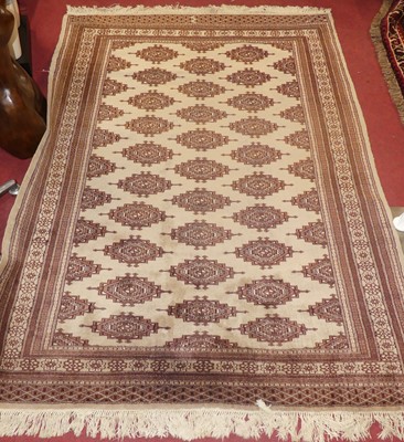 Lot 1171 - A Persian woollen grey ground Bokhara rug, 193...