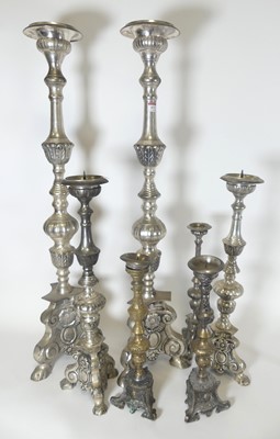 Lot 421 - A pair of polished metal pricket altar sticks,...