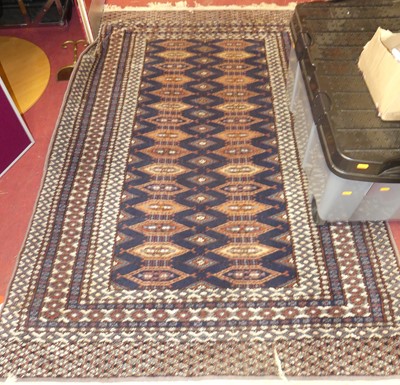 Lot 1173 - A Persian woollen blue ground Bokhara rug, the...
