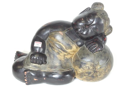 Lot 84 - A Thai carved and painted teak figure of a...