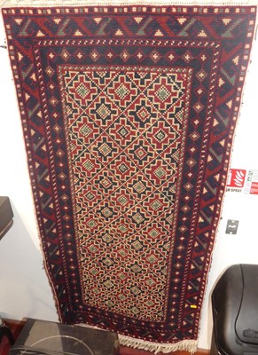 Lot 1200 - A Turkmen hand knotted prayer rug, the...