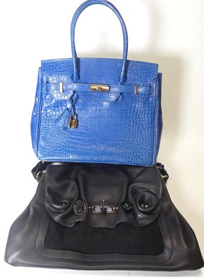 Lot 442 - A blue simulated alligator skin leather...