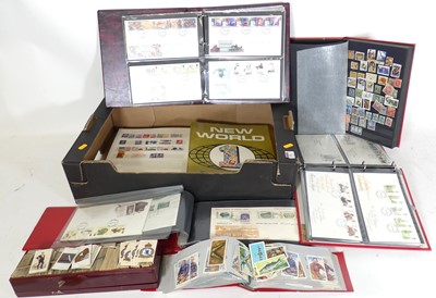Lot 272 - A collection of first day covers and cigarette...
