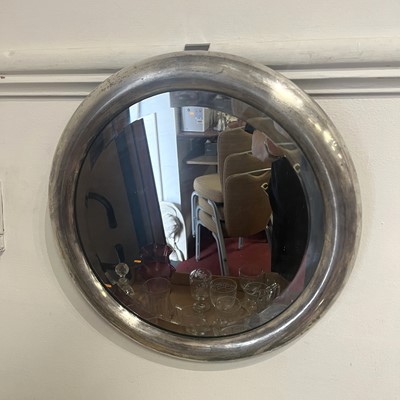 Lot 507 - An Albany polished metal framed wall mirror,...