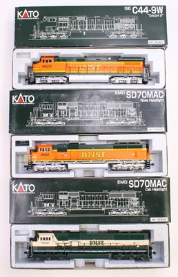 Lot 915 - Three Kato HO gauge locos to include a C44-9W...