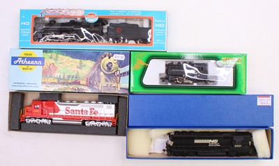 Lot 910 - Four HO gauge locos to include a Mehano 0-4-0...