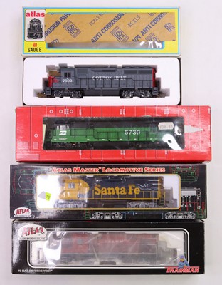 Lot 691 - Four Atlas HO gauge locos to include a GP-40...