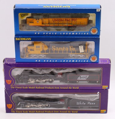 Lot 695 - Four HO gauge locos to include a Bachmann EMD...