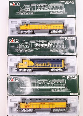 Lot 706 - Three Kato HO gauge locos to include an EMD SD-...