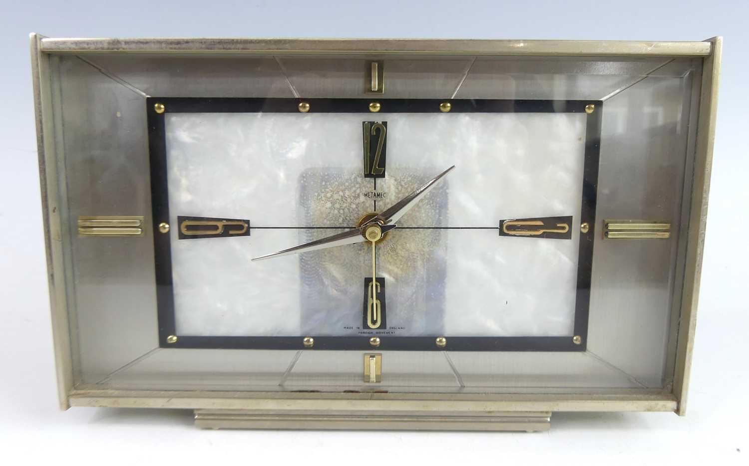 Lot 3 - A 1960s Metamec brushed metal mantel clock,...