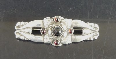 Lot 113 - Georg Jensen - a sterling silver brooch, the...