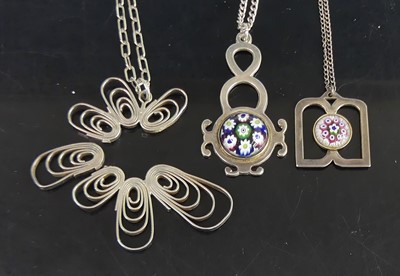 Lot 135 - Two silver pierced pendants by Caithness...