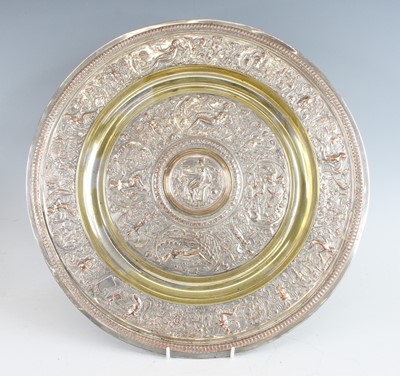 Lot 2128 - A silver plated and brass plaque / alms dish...