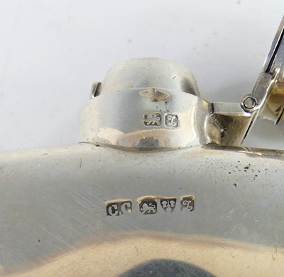 Lot 2099 - A George V silver hip flask, of typical oblong...