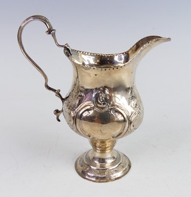 Lot 2119 - A George III silver cream jug, of helmet form...