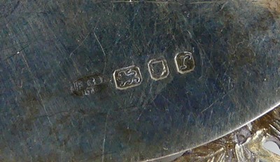 Lot 2102 - A collection of five silver decanter collars,...