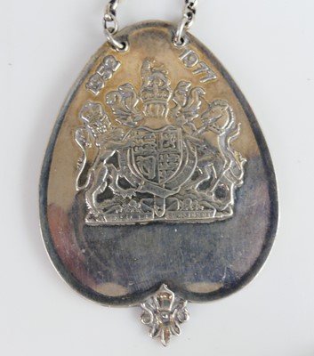 Lot 2102 - A collection of five silver decanter collars,...