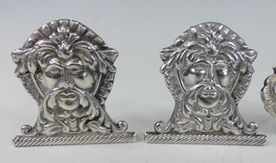 Lot 2104 - A collection of silver and white metal novelty...