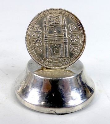 Lot 2104 - A collection of silver and white metal novelty...