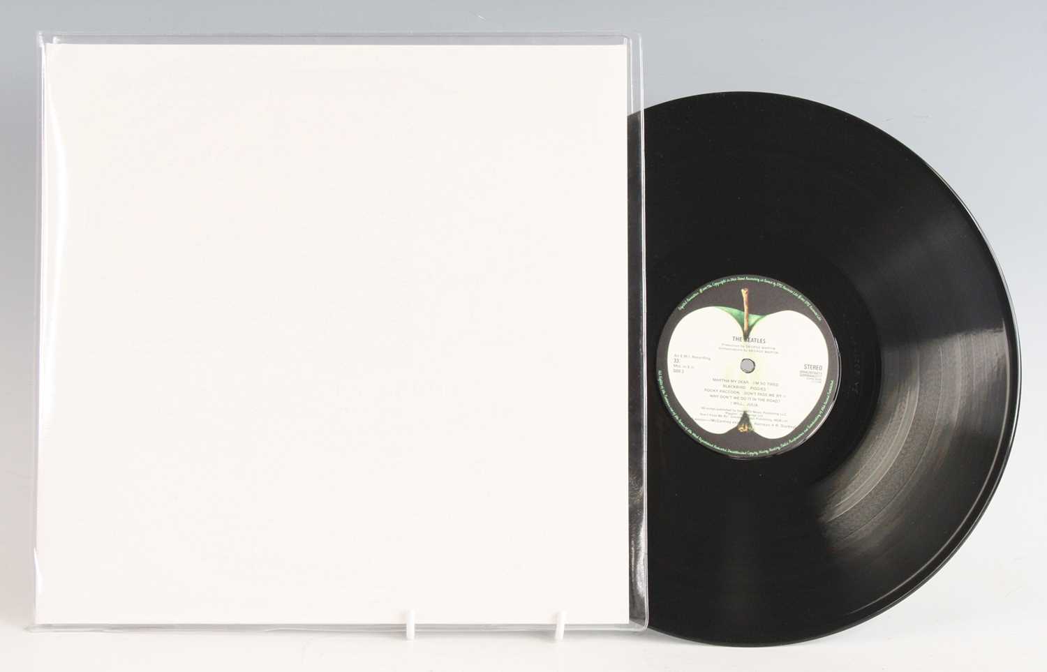 Lot 1017 - The Beatles - a collection of three re-issue...