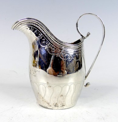 Lot 2118 - A George III silver cream jug, of helmet form...