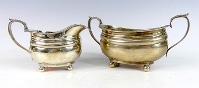 Lot 2161 - A George V silver cream jug and sugar bowl duo,...