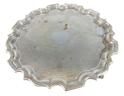 Lot 2174 - An Edwardian silver salver, of shaped circular...